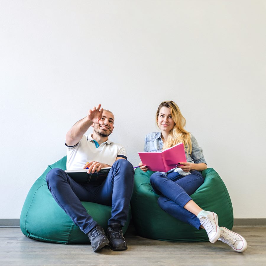 Friends chatting on green bean bags
