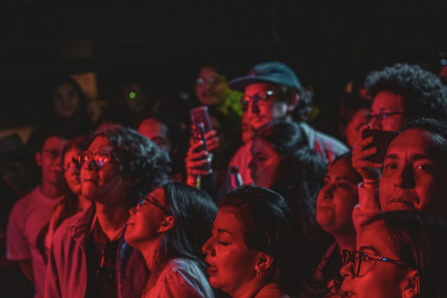 A crowd engaged at a night event