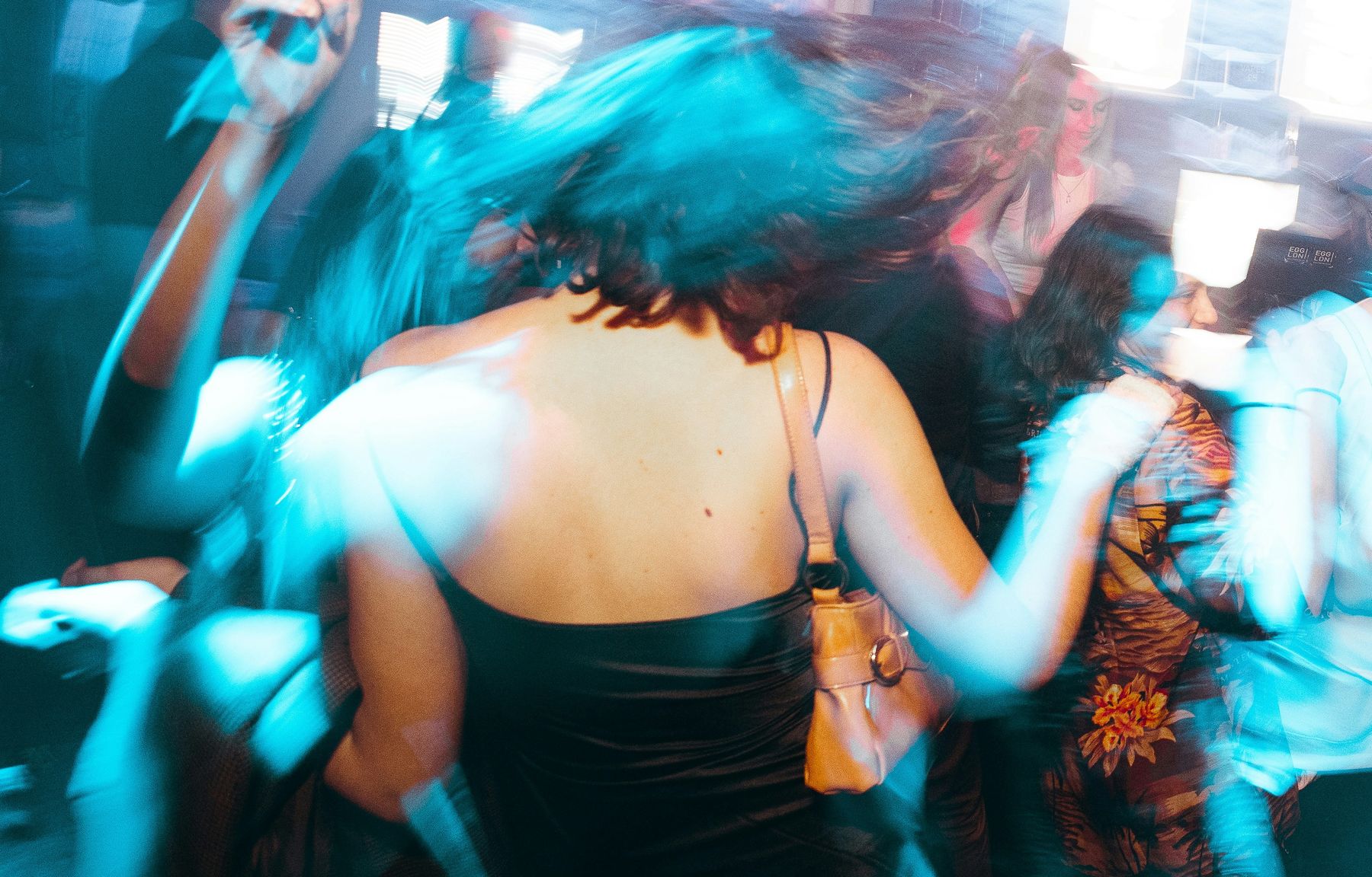 A glowing dancefloor under UV lighting at a Perth party