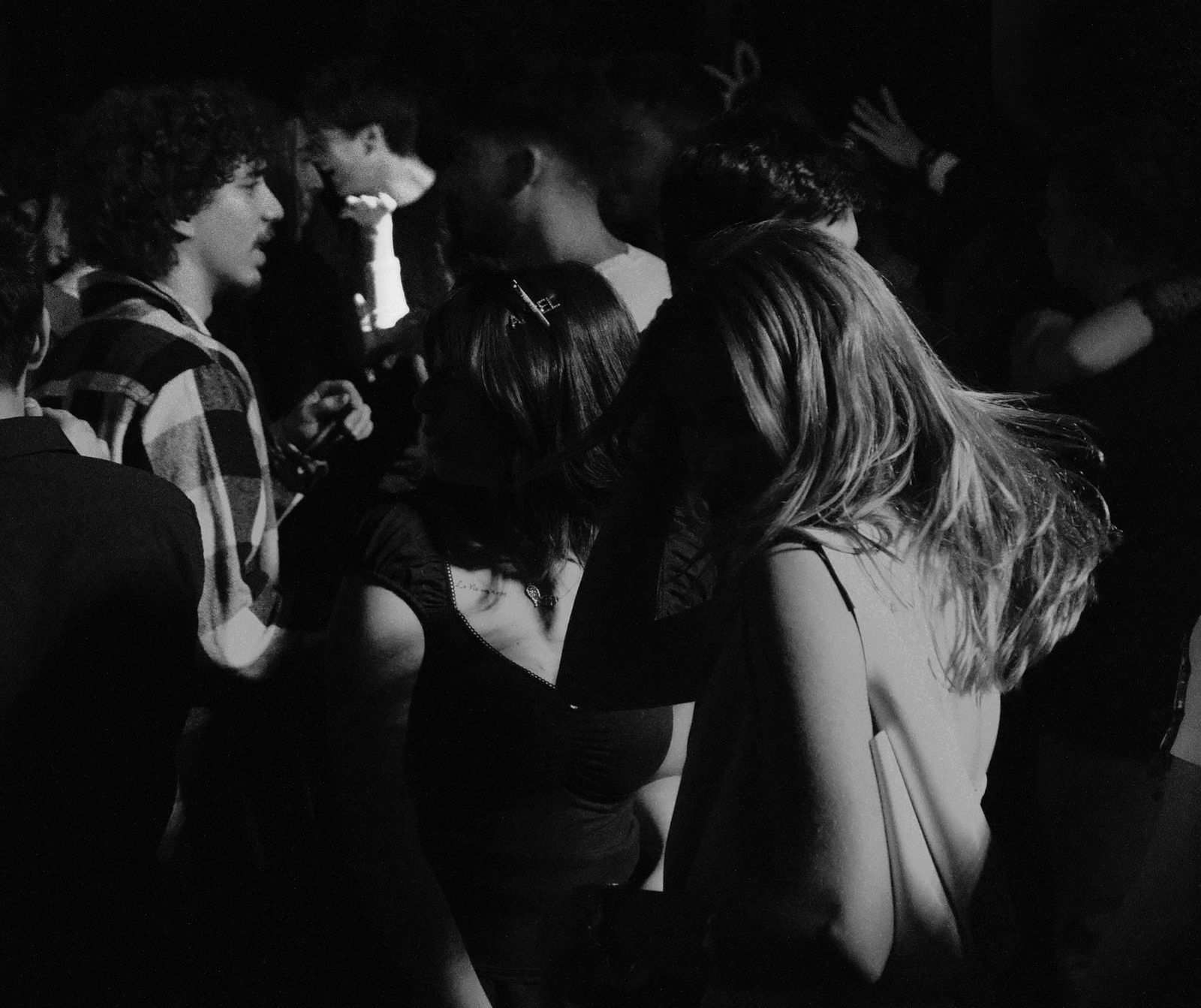 A crowd enjoying an outdoor event at night in Perth