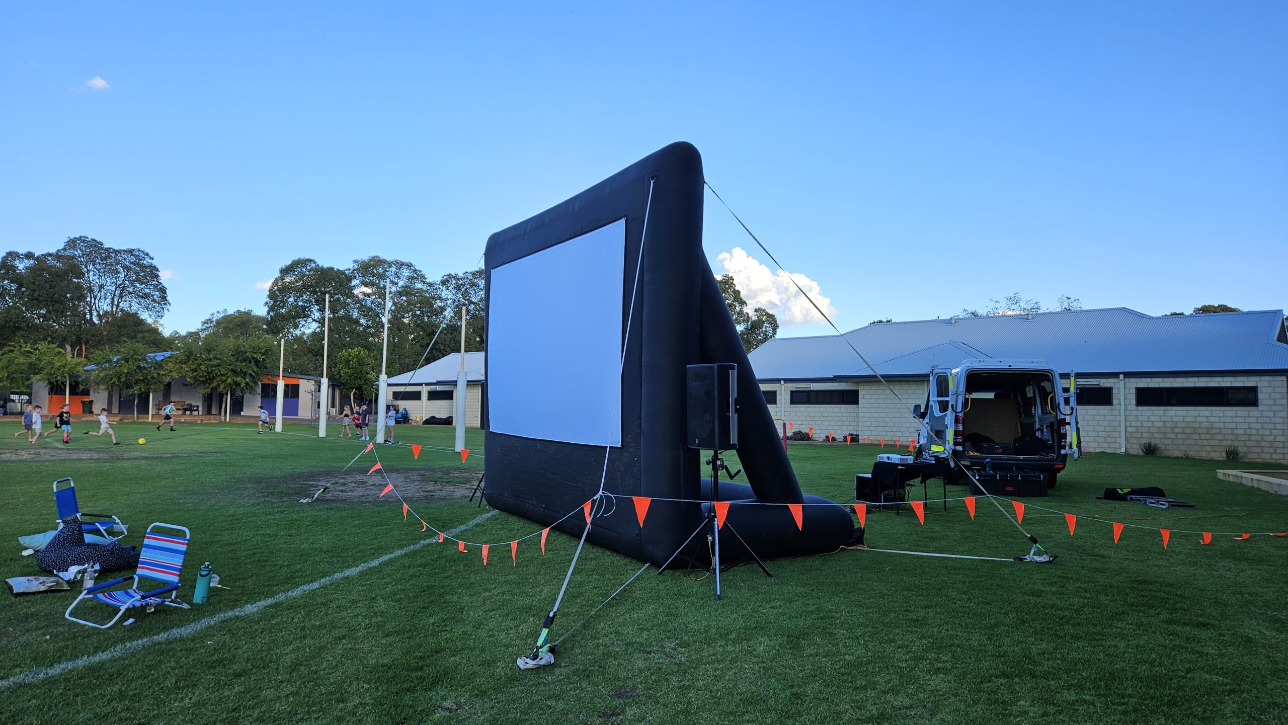 Halls Head movie night with family enjoying a film outdoors