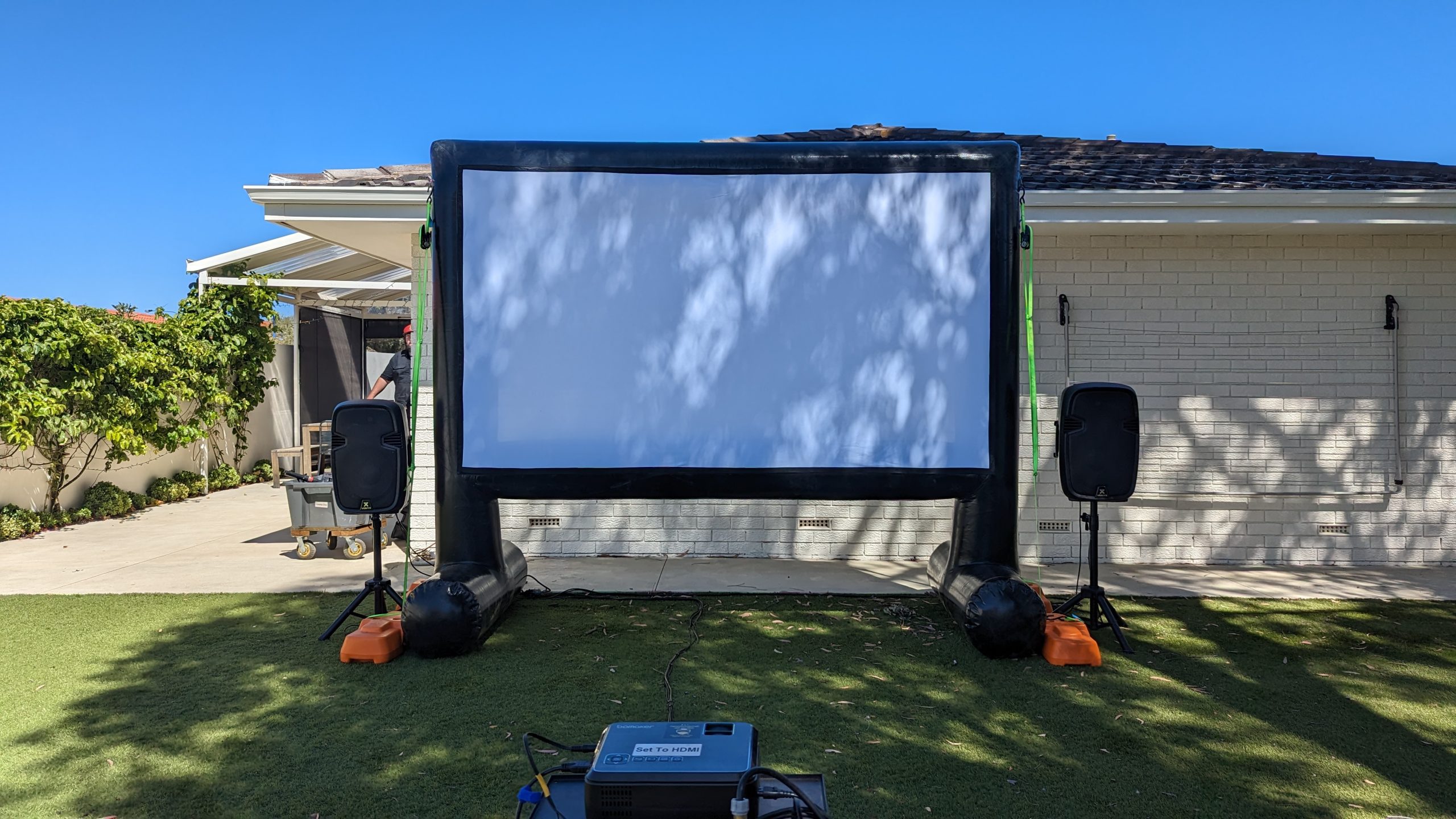 Community outdoor cinema night in Perth with large crowd on oval