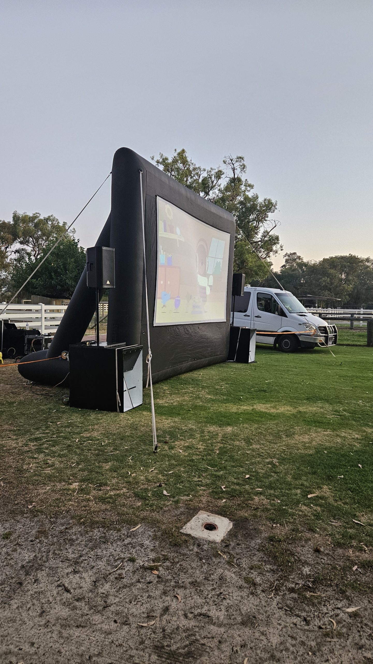 Outdoor cinema hire Mandurah — community foreshore event with full inflatable screen setup
