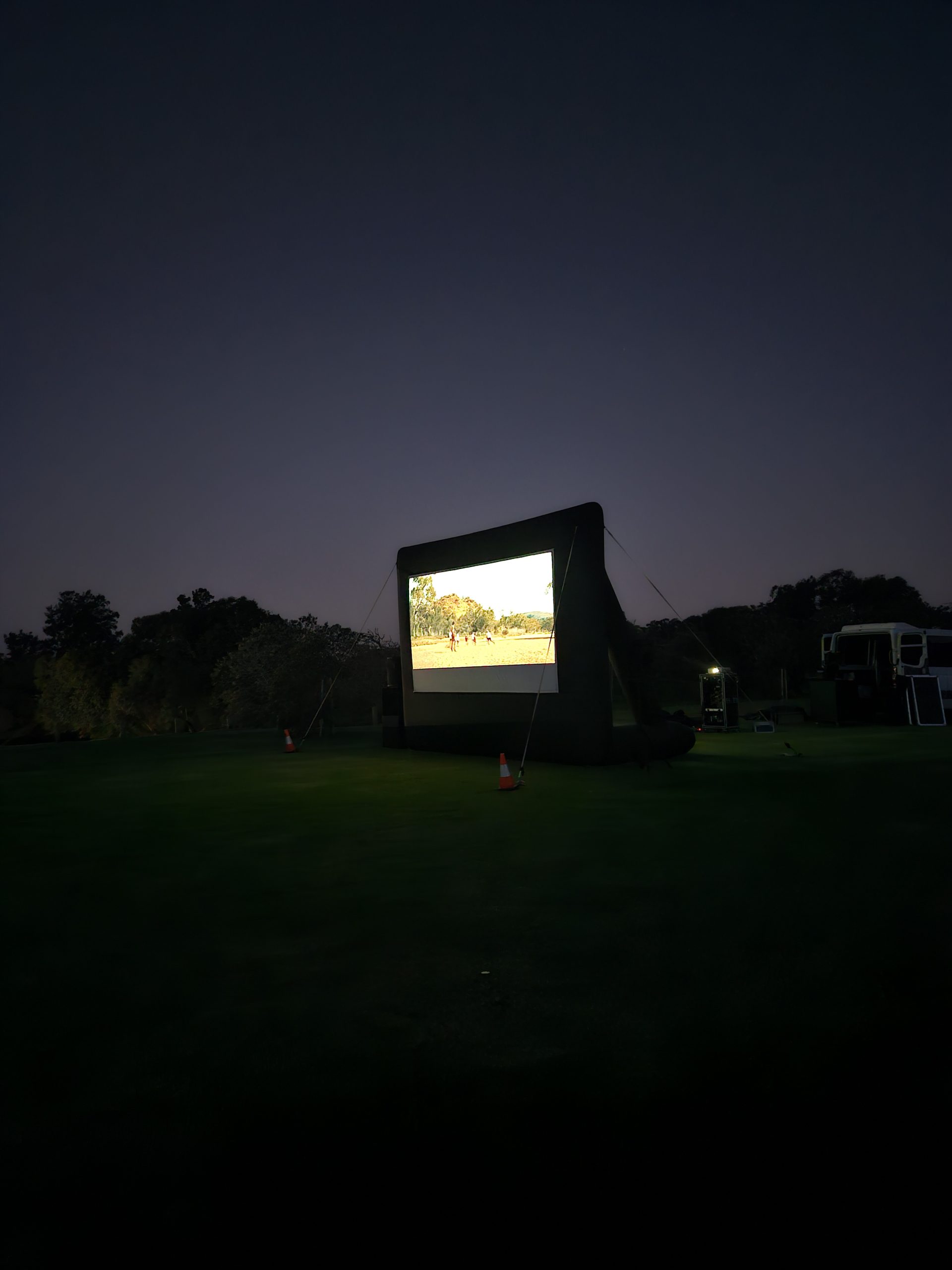 Outdoor cinema screen setup along the Mandurah coast near Halls Head